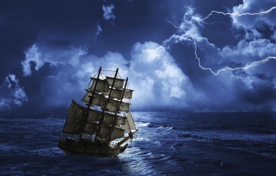 A ship sailing on stormy waters