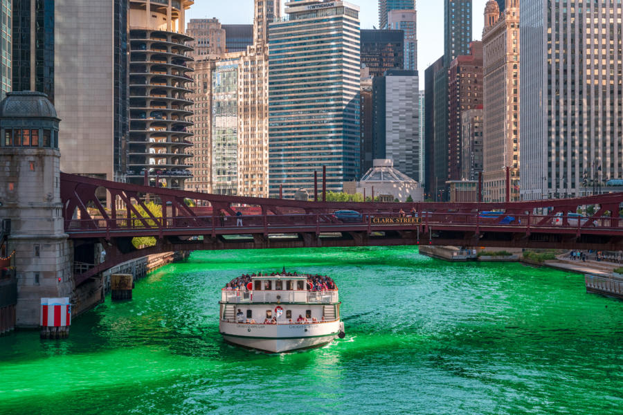 A boat on the green Chicago River on St. Patricks' Day