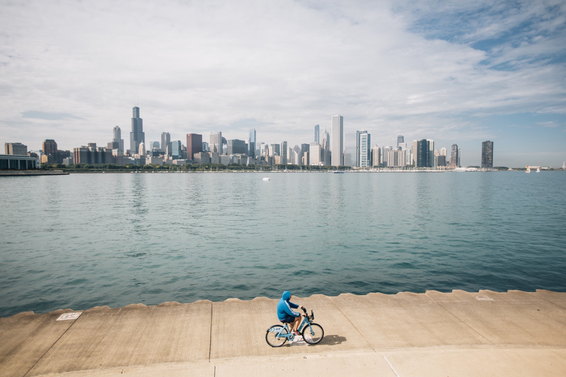 Chicago Skyline with bicyclist along the Lakefront Trail