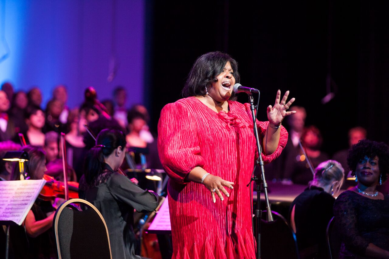 A singer at Too Hot to Handel: Auditorium Theatre
