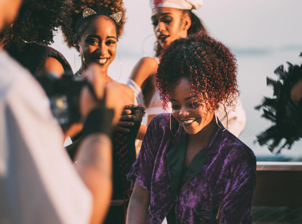 Young people dance at a Halloween party.