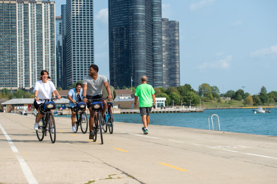 A family bikes along Chicago's Lakefront Trail