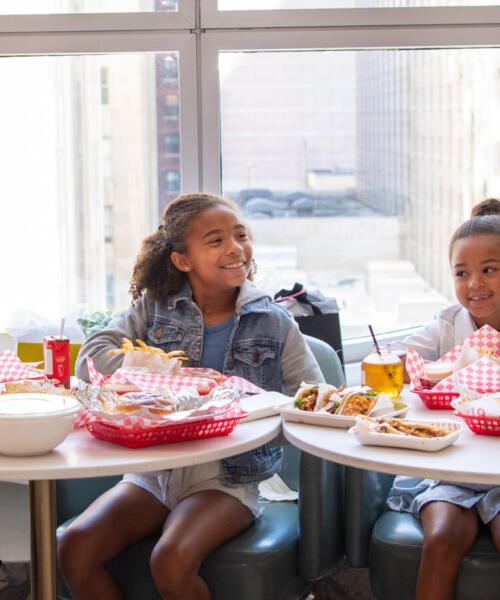 A family dines at 900 N Michigan
