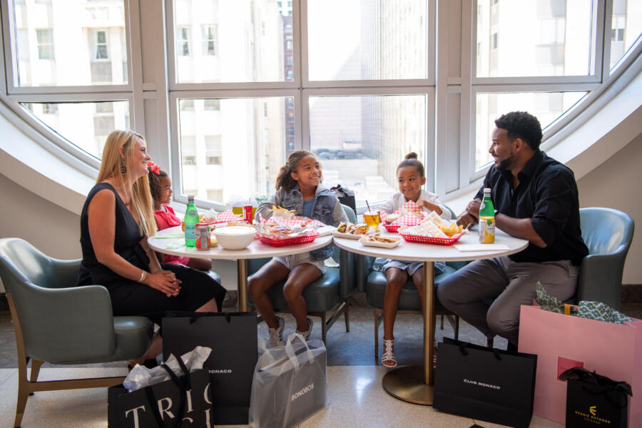 A family dines at 900 N Michigan