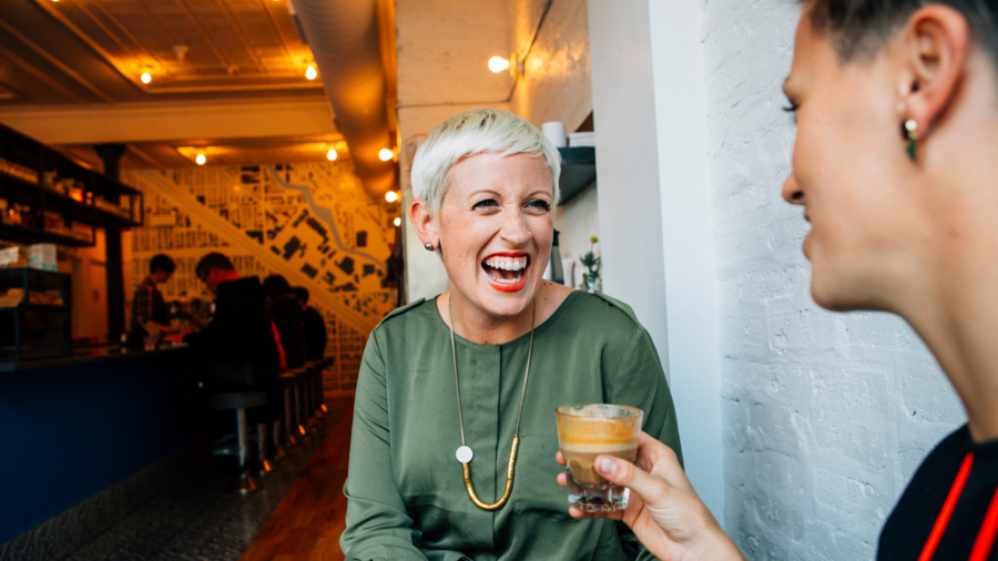Woman getting drinks at the bar