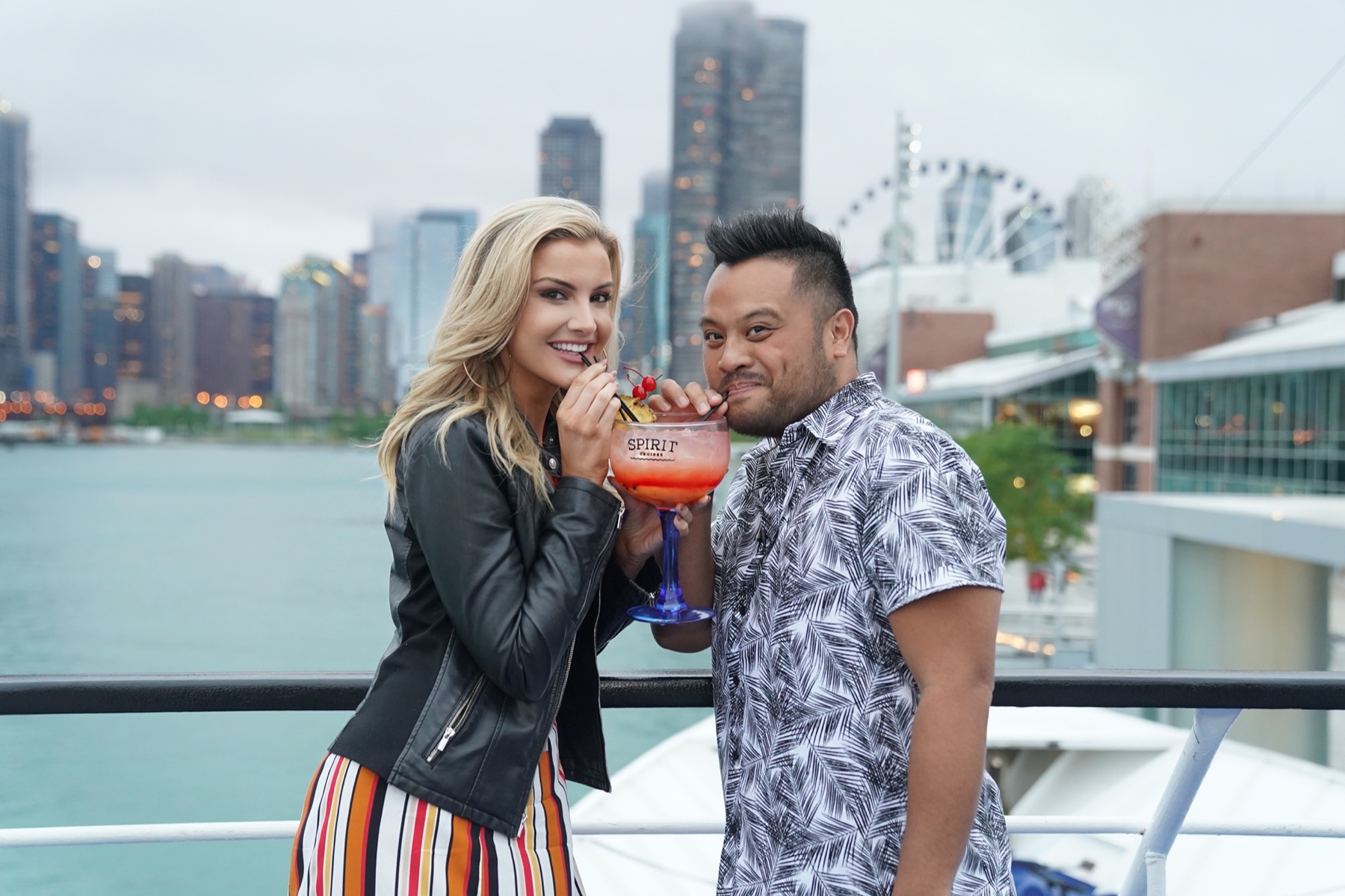 Couple sharing a drink on A Spirit of Chicago dinner cruise on Lake Michigan