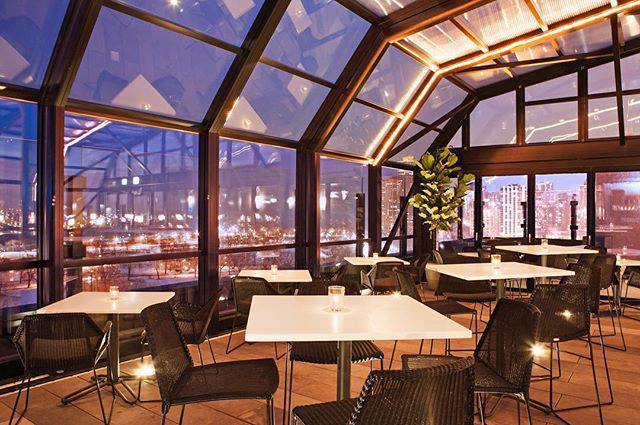 Interior of The J. Parker rooftop restaurant with views of Chicago