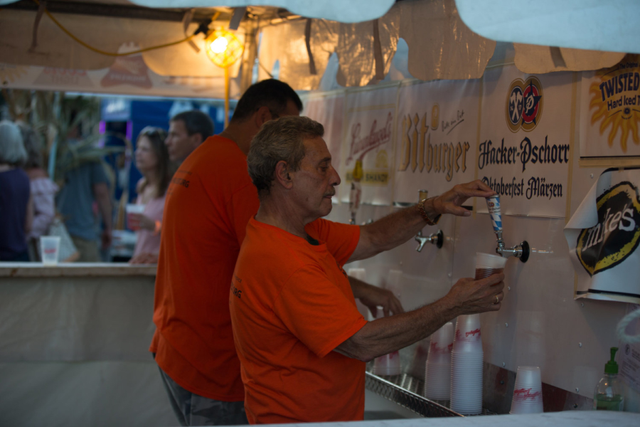 Men pouring beers at the Norwood Park Fall Fest in Chicago
