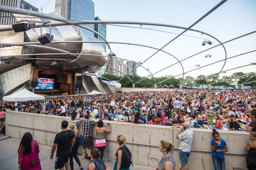 People gather in Millennium Park for the Summer Film Series