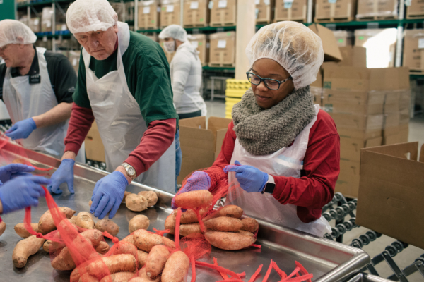 People packaging potatoes at the Greater Chicago Food Depository