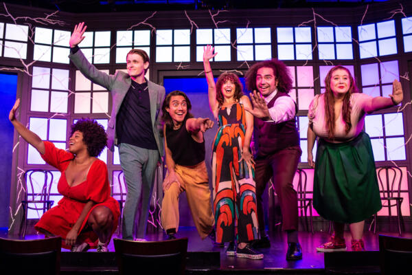 Second City actors on stage