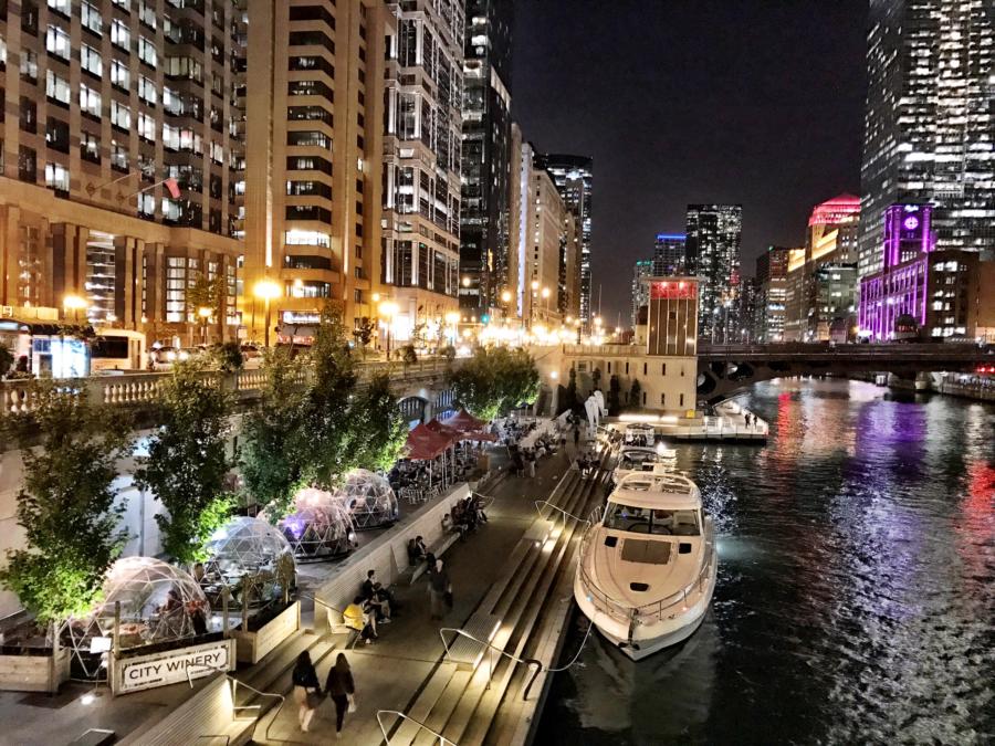 A nighttime view of the City Winery domes on the Chicago Riverwalk