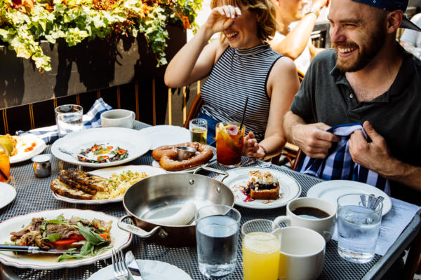 Friends dine on the Publican patio