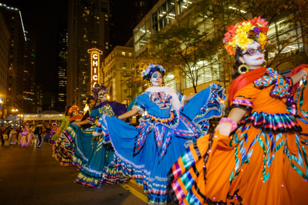 Smaller Ballet Folklorico Xochitl girls in a line at the Arts in the Dark parade