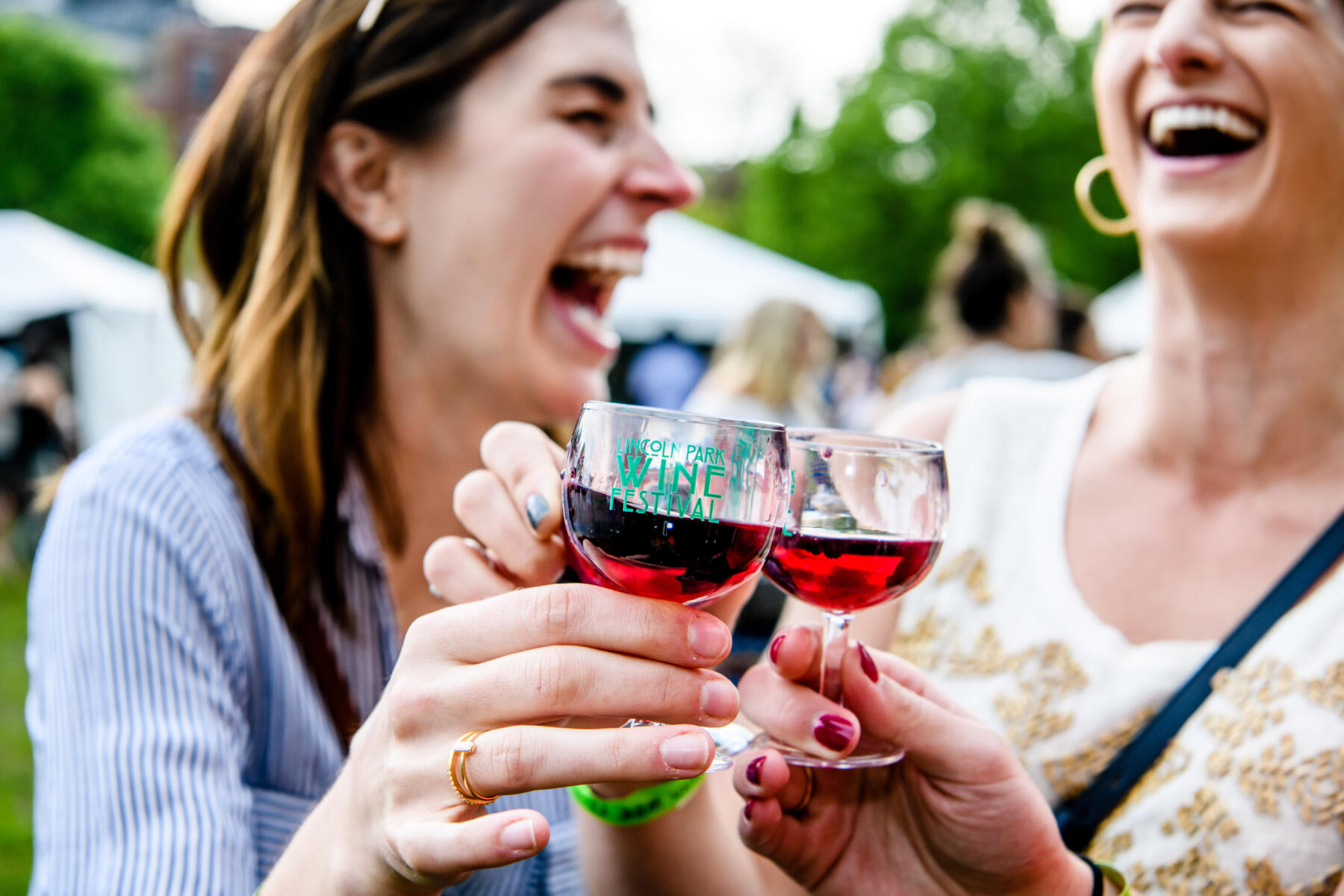 Women laughing at Lincoln Park Wine Fest