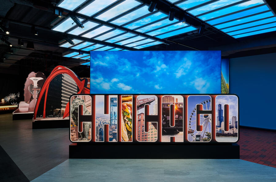 A large sign reading "Chicago" inside the new SkyDeck experience. 
