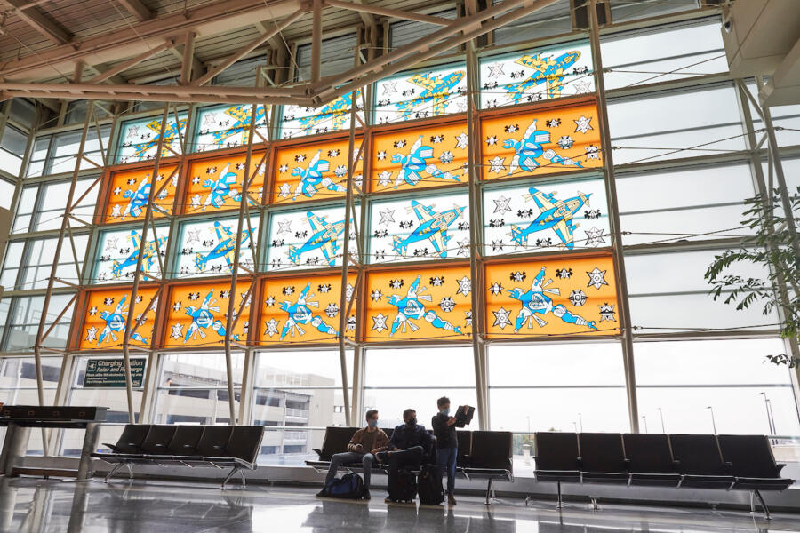 Families can explore the public art at Midway Airport like the Tuskegee Airmen Commemorative mural