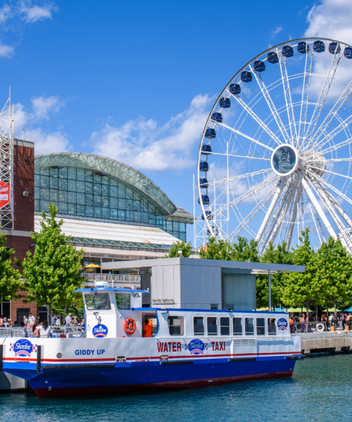 Navy Pier in summer with the Centennial Wheel and waterfront views. A lively Chicago destination for events and group experiences.