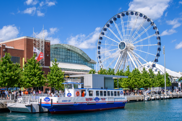 Navy Pier in summer with the Centennial Wheel and waterfront views. A lively Chicago destination for events and group experiences.