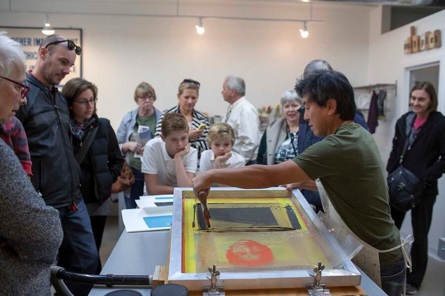 Chicago Printmakers Collaborative, a printmaker does a demonstration