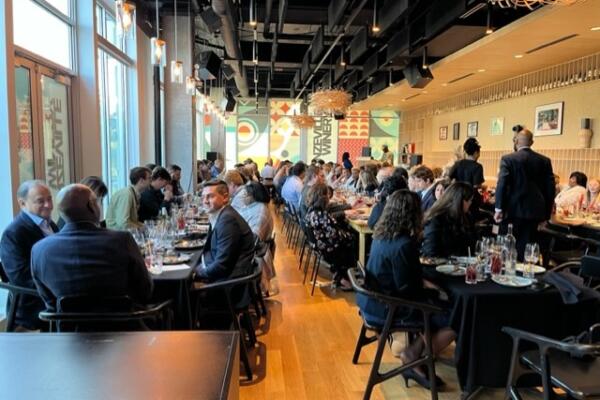 Diners seated at tables inside the Bronzeville Winery