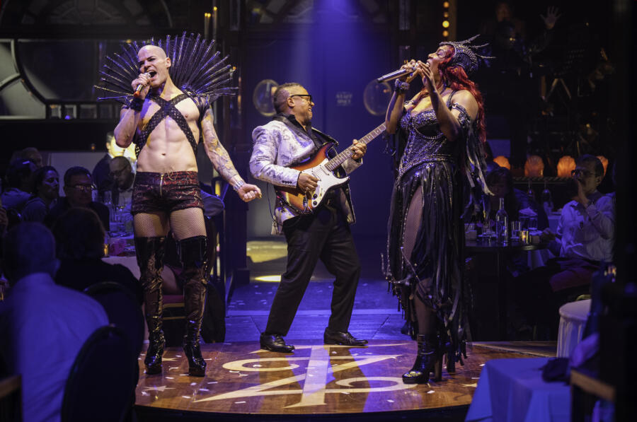 A group sings cabaret during Teatro ZinZanni