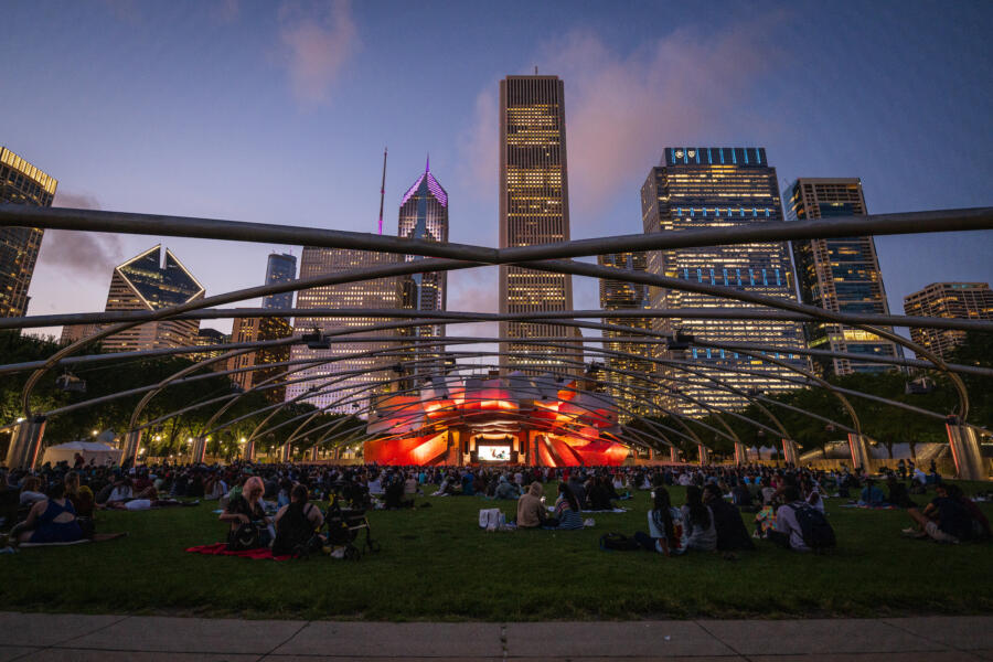 A view of the Millennium Park Summer Film Series at dusk