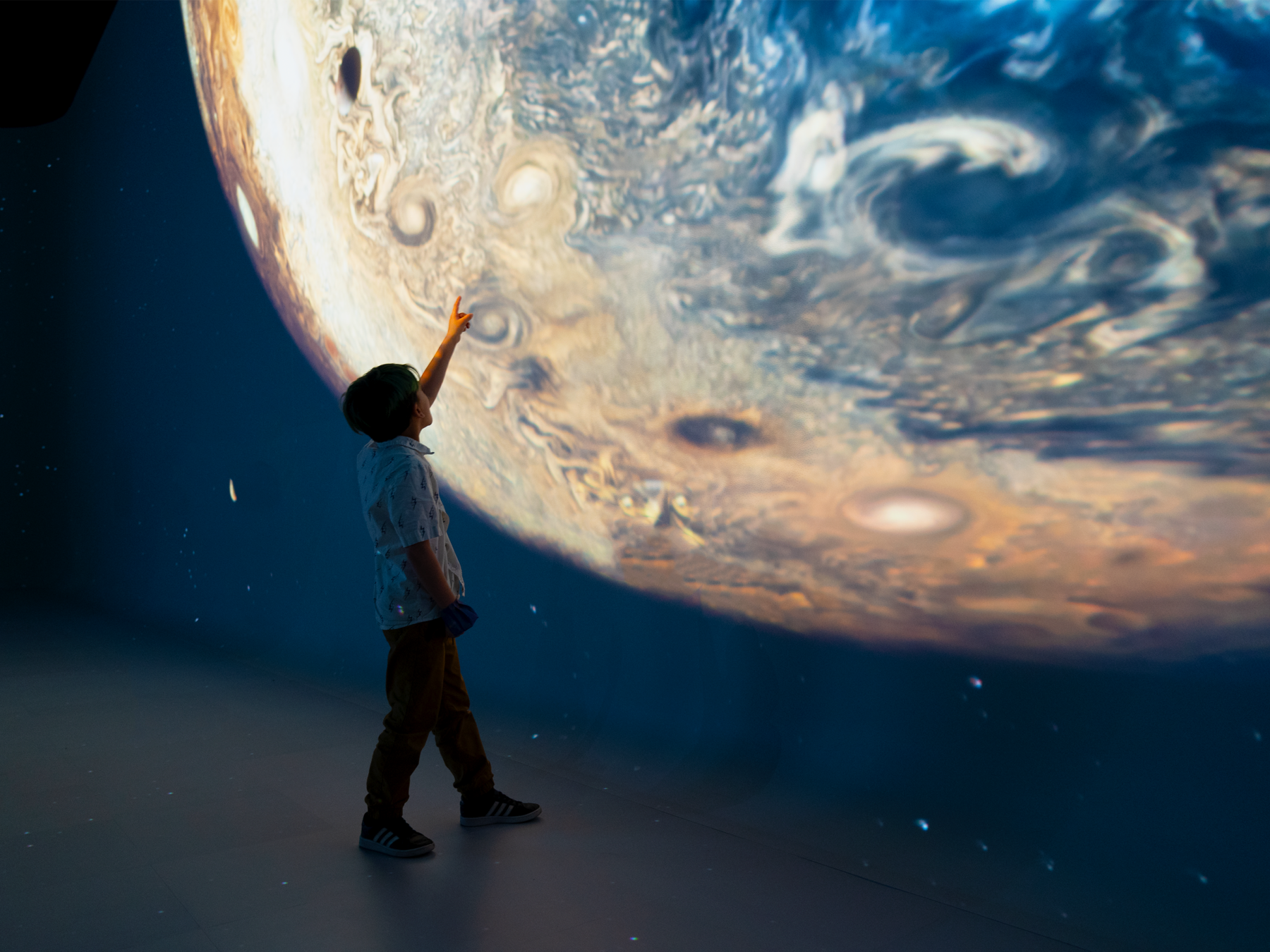 KID POINTING AT PLANET (1)