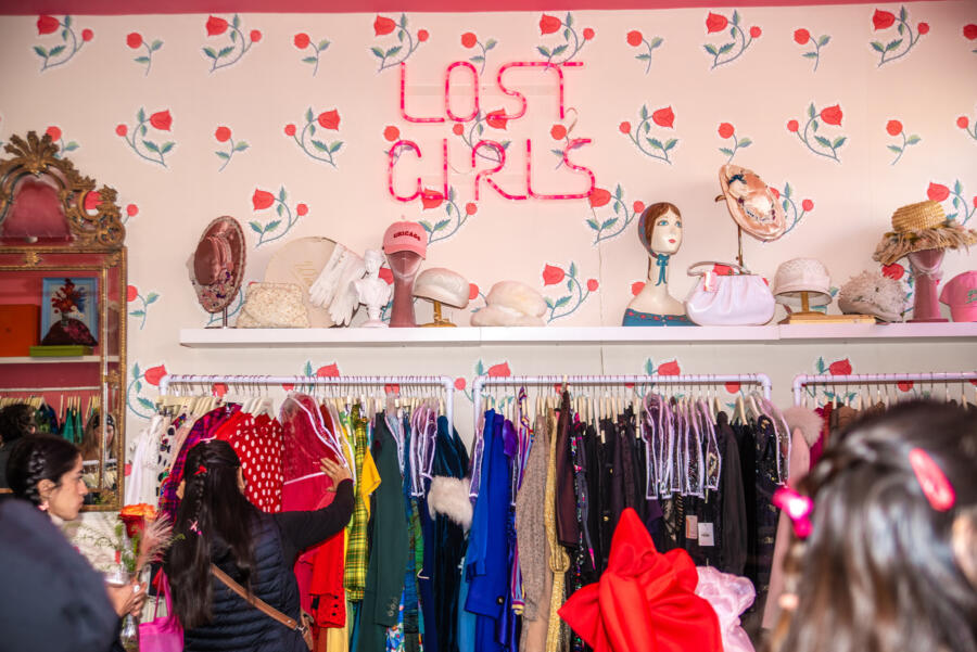 A neon sign in Lost Girls Vintage in Chicago