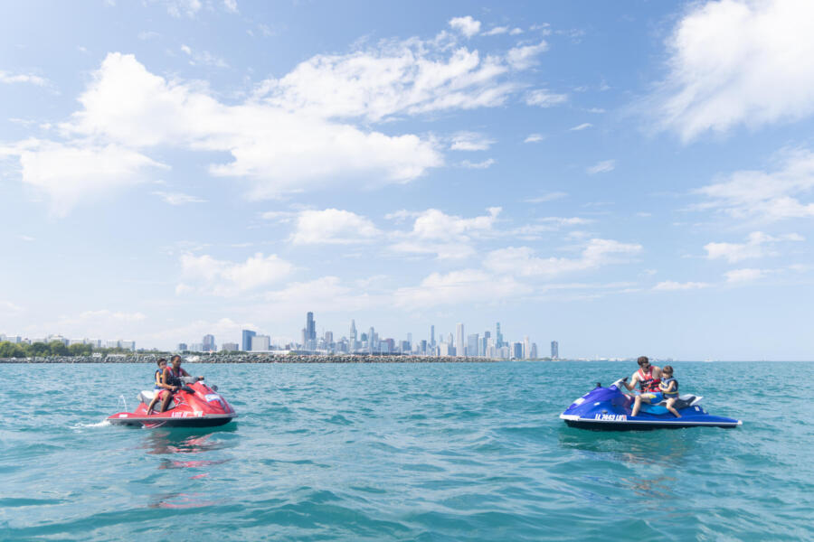 People jet ski at 31st Street Beach