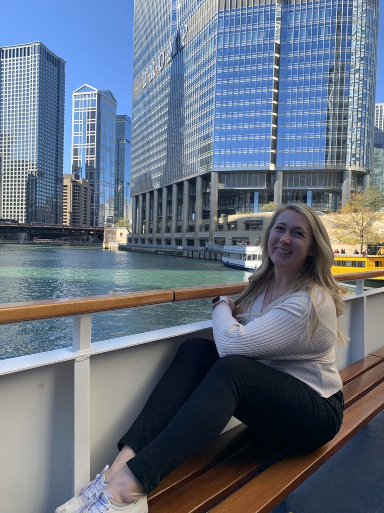 A young woman on a boat tour of Chicago