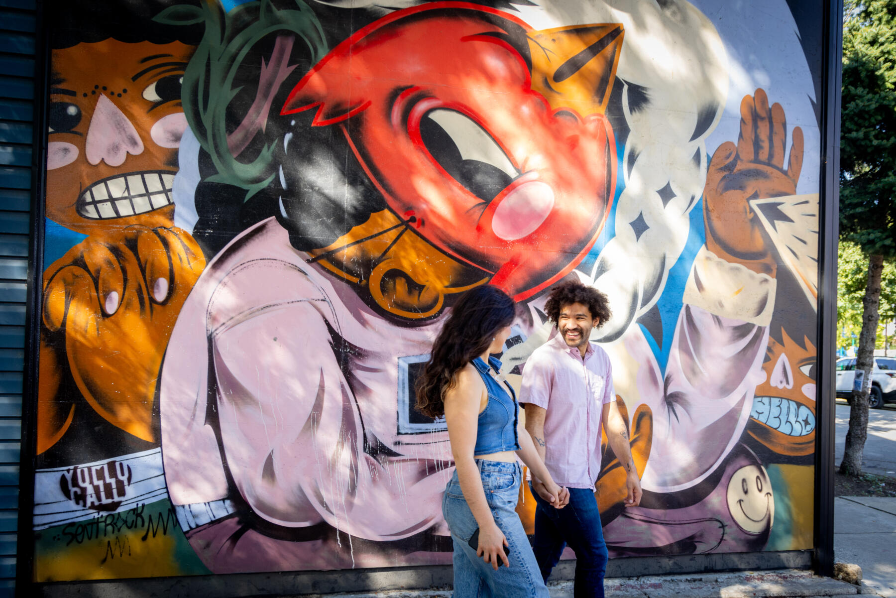 Pilsen neighborhood in Chicago with a mural by street artist Sentrock, photo by Kathleen Hinkel